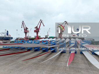 Wind power equipment is being prepared for export at the terminal in Lianyungang, Jiangsu province, in Lianyungang, China, on May 25, 2024....