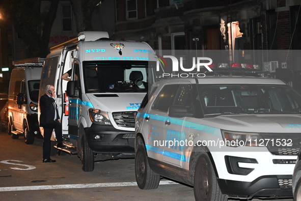 Crime scene investigators from the NYPD Crime Scene Unit are investigating the shooting death of 37-year-old Marcus Henderson, who was shot...