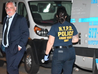 Crime scene investigators from the NYPD Crime Scene Unit are investigating the shooting death of 37-year-old Marcus Henderson, who was shot...