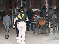 Crime scene investigators from the NYPD Crime Scene Unit are investigating the shooting death of 37-year-old Marcus Henderson, who was shot...