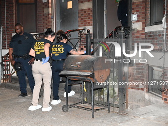 Crime scene investigators from the NYPD Crime Scene Unit are investigating the shooting death of 37-year-old Marcus Henderson, who was shot...