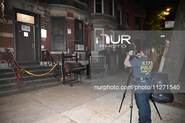 Crime scene investigators from the NYPD Crime Scene Unit are investigating the shooting death of 37-year-old Marcus Henderson, who was shot...