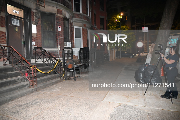 Crime scene investigators from the NYPD Crime Scene Unit are investigating the shooting death of 37-year-old Marcus Henderson, who was shot...