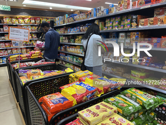Shoppers are purchasing groceries at the Pothy's market in Thiruvananthapuram (Trivandrum), Kerala, India, on April 08, 2024. (