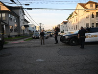 Police officers are blocking the area of the crime scene on Saturday morning. Three people are being shot in Paterson, New Jersey, United St...