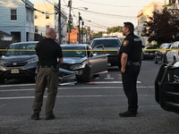 Police officers are blocking the area of the crime scene on Saturday morning. Three people are being shot in Paterson, New Jersey, United St...