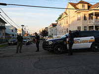 Police officers are blocking the area of the crime scene on Saturday morning. Three people are being shot in Paterson, New Jersey, United St...