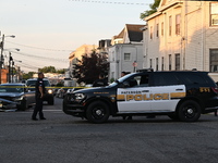 Police officers are blocking the area of the crime scene on Saturday morning. Three people are being shot in Paterson, New Jersey, United St...