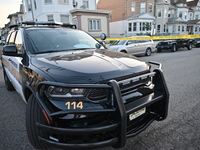 Police officers are blocking the area of the crime scene on Saturday morning. Three people are being shot in Paterson, New Jersey, United St...