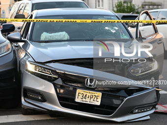 A vehicle is being damaged by bullet holes at the crime scene in Paterson, New Jersey, United States, on May 25, 2024. At approximately 1:50...