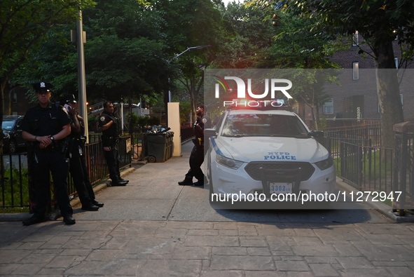 Police are present at the crime scene in Manhattan, New York, United States, on May 25, 2024. An unidentified male victim is being transport...