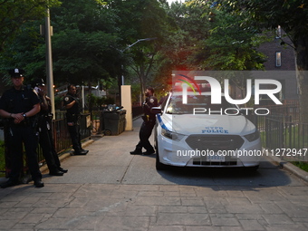 Police are present at the crime scene in Manhattan, New York, United States, on May 25, 2024. An unidentified male victim is being transport...