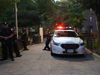 Police are present at the crime scene in Manhattan, New York, United States, on May 25, 2024. An unidentified male victim is being transport...