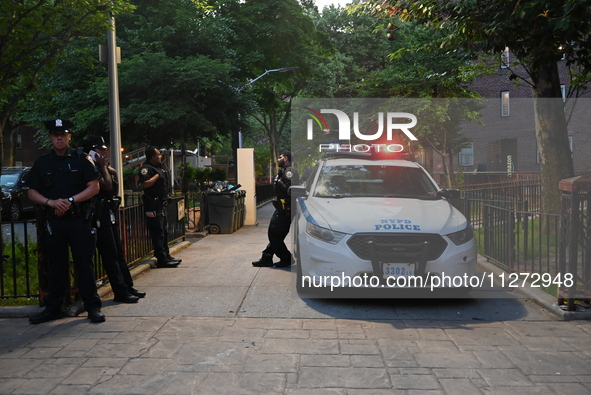 Police are present at the crime scene in Manhattan, New York, United States, on May 25, 2024. An unidentified male victim is being transport...