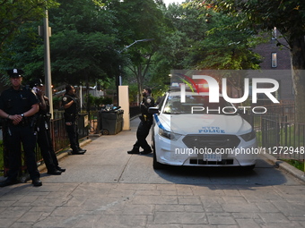 Police are present at the crime scene in Manhattan, New York, United States, on May 25, 2024. An unidentified male victim is being transport...