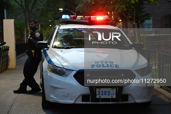 Police are present at the crime scene in Manhattan, New York, United States, on May 25, 2024. An unidentified male victim is being transport...