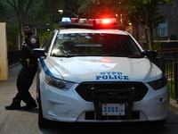 Police are present at the crime scene in Manhattan, New York, United States, on May 25, 2024. An unidentified male victim is being transport...