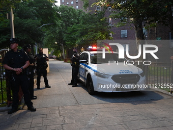 Police are present at the crime scene in Manhattan, New York, United States, on May 25, 2024. An unidentified male victim is being transport...