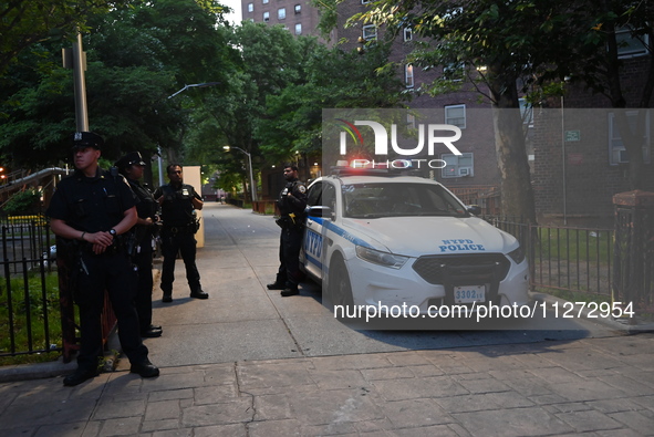 Police are present at the crime scene in Manhattan, New York, United States, on May 25, 2024. An unidentified male victim is being transport...