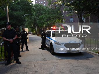 Police are present at the crime scene in Manhattan, New York, United States, on May 25, 2024. An unidentified male victim is being transport...