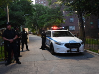 Police are present at the crime scene in Manhattan, New York, United States, on May 25, 2024. An unidentified male victim is being transport...