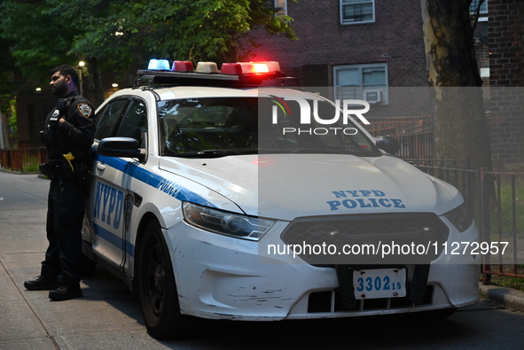 Police are present at the crime scene in Manhattan, New York, United States, on May 25, 2024. An unidentified male victim is being transport...