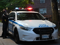 Police are present at the crime scene in Manhattan, New York, United States, on May 25, 2024. An unidentified male victim is being transport...