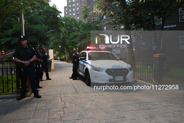 Police are present at the crime scene in Manhattan, New York, United States, on May 25, 2024. An unidentified male victim is being transport...