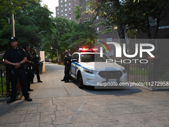 Police are present at the crime scene in Manhattan, New York, United States, on May 25, 2024. An unidentified male victim is being transport...