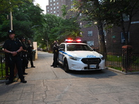 Police are present at the crime scene in Manhattan, New York, United States, on May 25, 2024. An unidentified male victim is being transport...