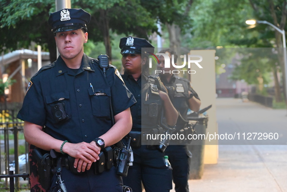 Police are present at the crime scene in Manhattan, New York, United States, on May 25, 2024. An unidentified male victim is being transport...