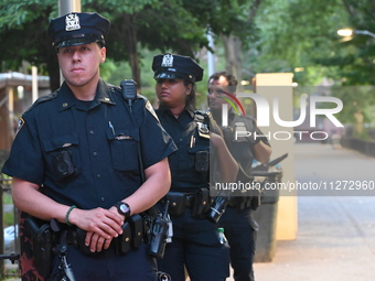 Police are present at the crime scene in Manhattan, New York, United States, on May 25, 2024. An unidentified male victim is being transport...