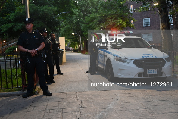 Police are present at the crime scene in Manhattan, New York, United States, on May 25, 2024. An unidentified male victim is being transport...