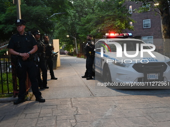 Police are present at the crime scene in Manhattan, New York, United States, on May 25, 2024. An unidentified male victim is being transport...