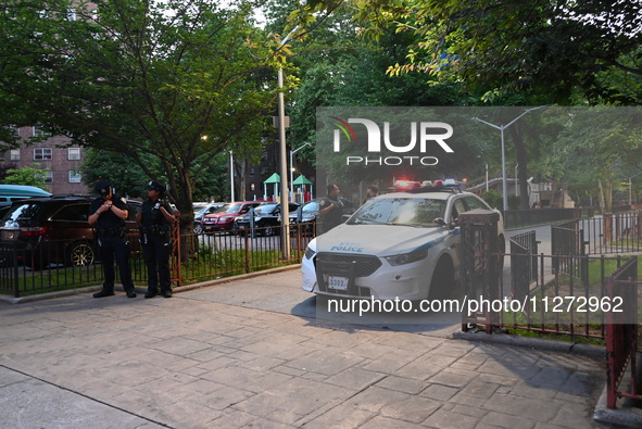 Police are present at the crime scene in Manhattan, New York, United States, on May 25, 2024. An unidentified male victim is being transport...