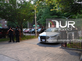 Police are present at the crime scene in Manhattan, New York, United States, on May 25, 2024. An unidentified male victim is being transport...