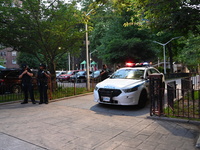 Police are present at the crime scene in Manhattan, New York, United States, on May 25, 2024. An unidentified male victim is being transport...