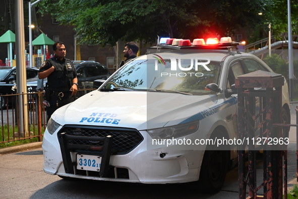 Police are present at the crime scene in Manhattan, New York, United States, on May 25, 2024. An unidentified male victim is being transport...