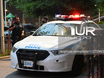 Police are present at the crime scene in Manhattan, New York, United States, on May 25, 2024. An unidentified male victim is being transport...