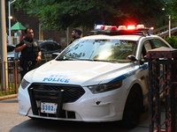 Police are present at the crime scene in Manhattan, New York, United States, on May 25, 2024. An unidentified male victim is being transport...