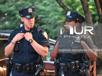 Police are present at the crime scene in Manhattan, New York, United States, on May 25, 2024. An unidentified male victim is being transport...