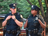 Police are present at the crime scene in Manhattan, New York, United States, on May 25, 2024. An unidentified male victim is being transport...