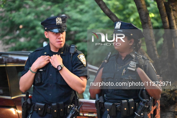 Police are present at the crime scene in Manhattan, New York, United States, on May 25, 2024. An unidentified male victim is being transport...