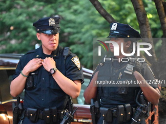 Police are present at the crime scene in Manhattan, New York, United States, on May 25, 2024. An unidentified male victim is being transport...