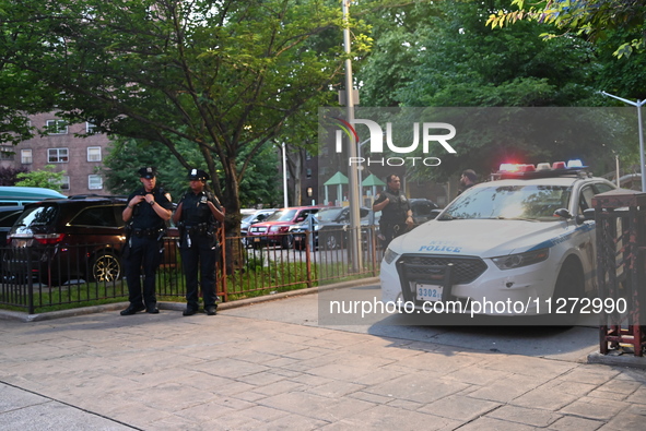 Police are present at the crime scene in Manhattan, New York, United States, on May 25, 2024. An unidentified male victim is being transport...