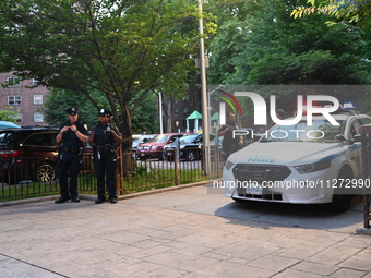 Police are present at the crime scene in Manhattan, New York, United States, on May 25, 2024. An unidentified male victim is being transport...