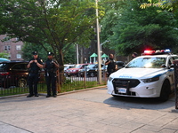 Police are present at the crime scene in Manhattan, New York, United States, on May 25, 2024. An unidentified male victim is being transport...