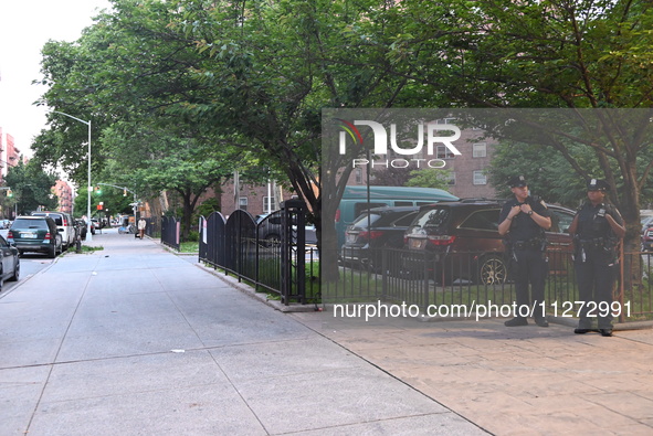 Police are present at the crime scene in Manhattan, New York, United States, on May 25, 2024. An unidentified male victim is being transport...