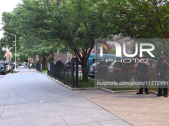 Police are present at the crime scene in Manhattan, New York, United States, on May 25, 2024. An unidentified male victim is being transport...