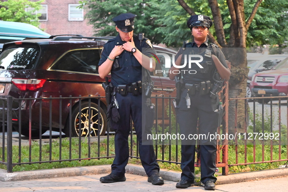 Police are present at the crime scene in Manhattan, New York, United States, on May 25, 2024. An unidentified male victim is being transport...